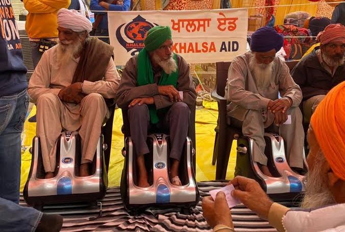 Foot massager and roti making machine