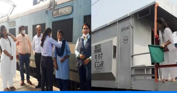 Indian railway employees women on lugguage wagon