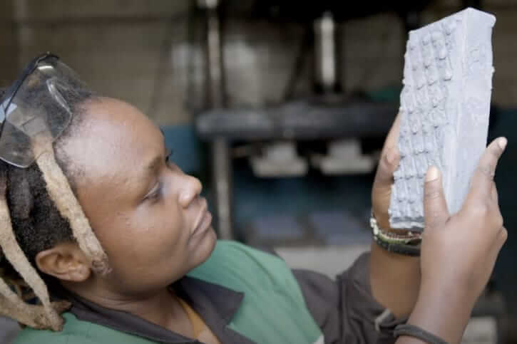 Nzambi matee invented bricks with recycled plastic