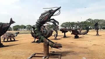 Metal scrap artist professor who is Upcycling materials and making beautiful idols