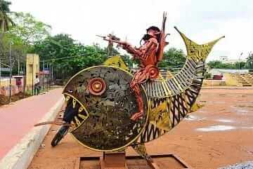 Metal scrap artist professor who is Upcycling materials and making beautiful idols