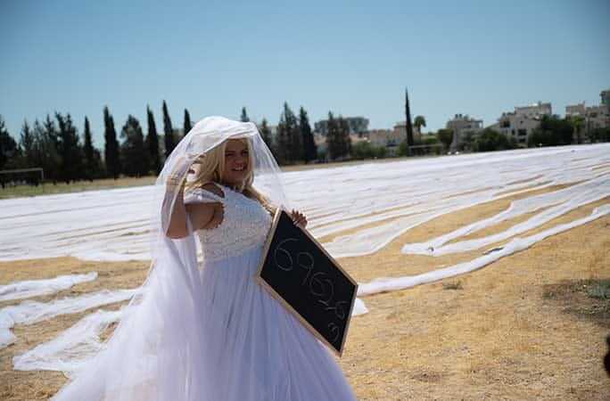 Bride Maria wears longest veil in her wedding name register in Guiness book of world record