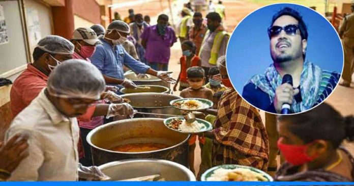 Singer Mika Singh distributing food
