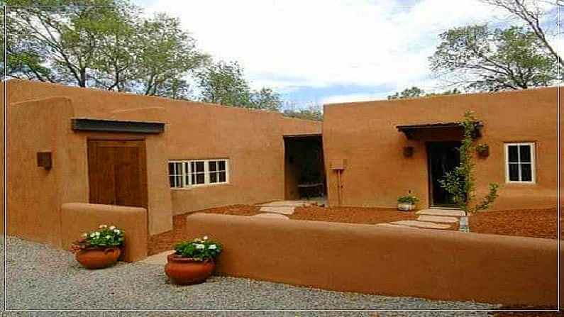 Air conditioned house by eco-friendly cow dung bricks and plaster