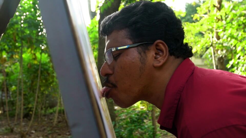 Indias first painter who uses tongue for making paintings Anil Varnam