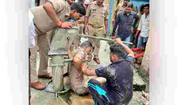 SI Ashish Kumar saved the life of a drowning man.