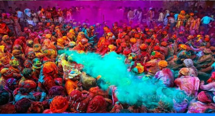 Why holi is celebrated what the main reason behind it