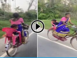 Desi Jugaad Technique A mother rode a bicycle by tying her child to her back