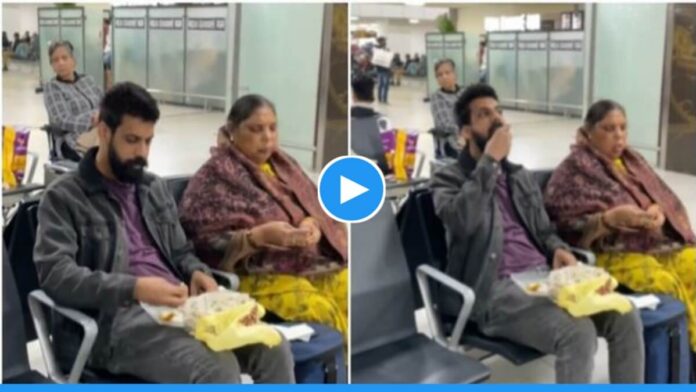 Viral video of man eating aloo parantha with mother at airport